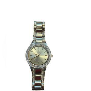 Jessica Simpson gold colored watch